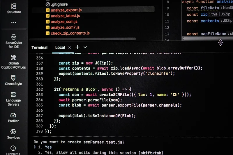 A computer screen displaying code and terminal output, representing an Aider pair-programming session